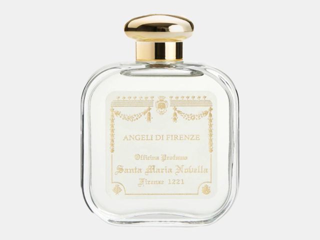 clear bottle of perfume with gold lid