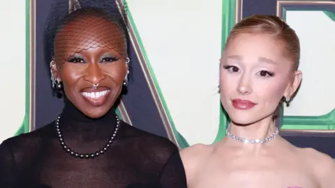 Getty Images Cynthia Erivo poses alongside Ariana Grande at the Wicked For Good premiere in New York