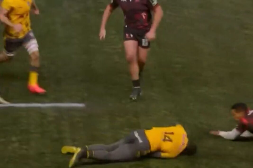 England international knocked out cold by swinging arm as medics rush to his aid