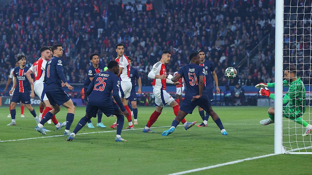 Gianluigi Donnarumma of Paris Saint-Germain makes a save from Gabriel Martinelli of Arsenal during the UEFA Champions League 2024/25 Semi Final Second Leg match between Paris Saint-Germain and Arsenal FC at Parc des Princes on May 07, 2025 in Paris, France