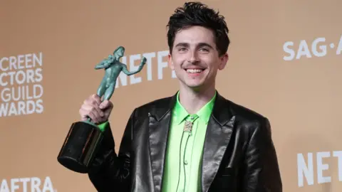 Getty Images Timoth&eacute;e Chalamet poses in the press room with the award for Outstanding Performance by a Male Actor in a Leading Role in a Motion Picture for "A Complete Unknown" during the 31st Annual Screen Actors Guild Awards at Shrine Auditorium and Expo Hall on February 23, 2025 in Los Angeles, California.