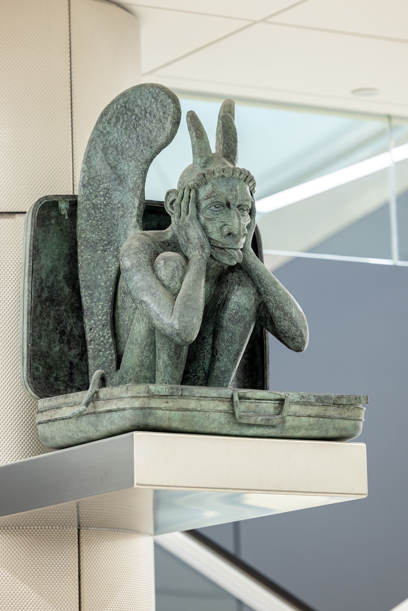 Image may contain Accessories Ornament Art Person Gargoyle Sculpture and Statue