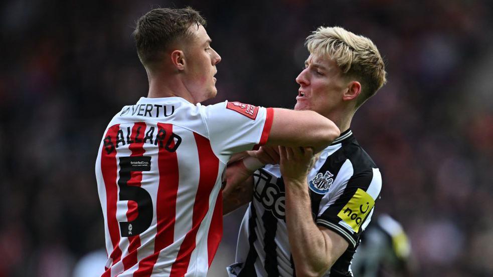 Dan Ballard clashes with Anthony Gordon during Sunderland's FA Cup third-round tie against Newcastle United at the Stadium of Light on 6 January, 2024.