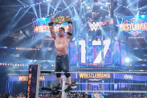 Rich Freeda/WWE via Getty Images John Cena celebrates his win during WrestleMania 41 Sunday at Allegiant Stadium on April 20, 2025 in Las Vegas, Nevada.