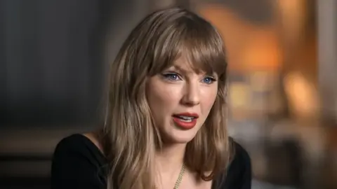 Disney Taylor Swift speaks in a still image from her Disney+ documentary, The End of an Era