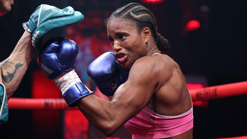Caroline Dubois punches on the pads