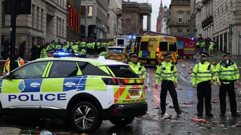 Getty Images Police at the scene of the parade crash in Water Street, Liverpool