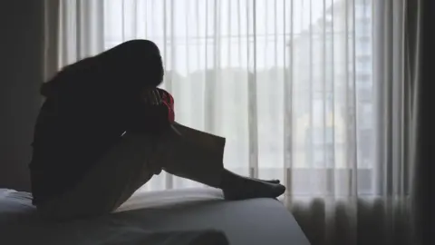 Asylum hotel firm hands back almost £14m in profits amid anger over service