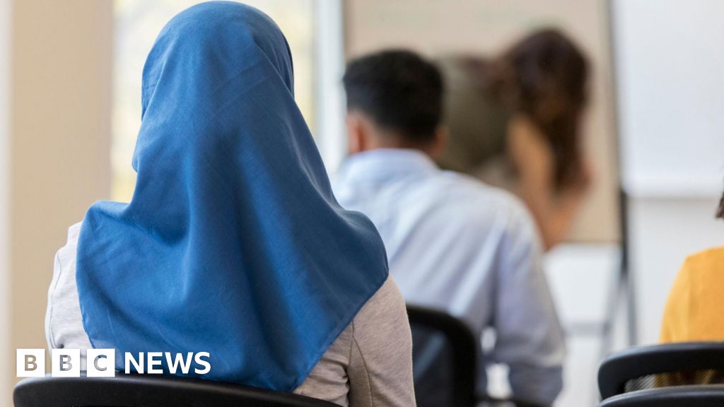 Austria bans headscarves in schools for under-14s
