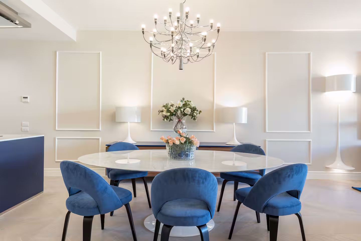 Image may contain Architecture Building Dining Room Dining Table Furniture Indoors Room Table Chandelier and Lamp