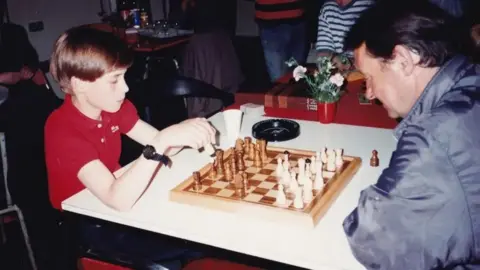 THE PASSAGE Prince William playing chess at the Passage charity in Westminster