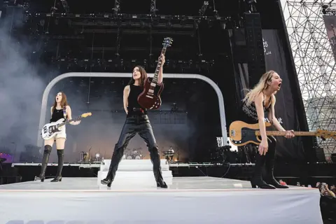 Everyone is invited to be the fourth Haim sister