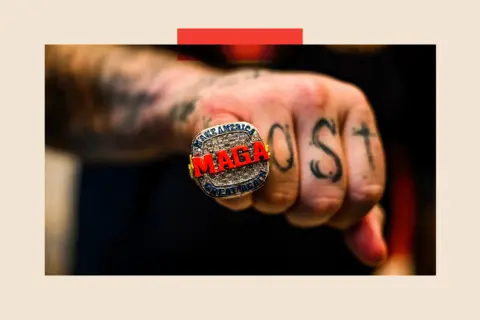 AFP via Getty Images Someone wears a MAGA ring