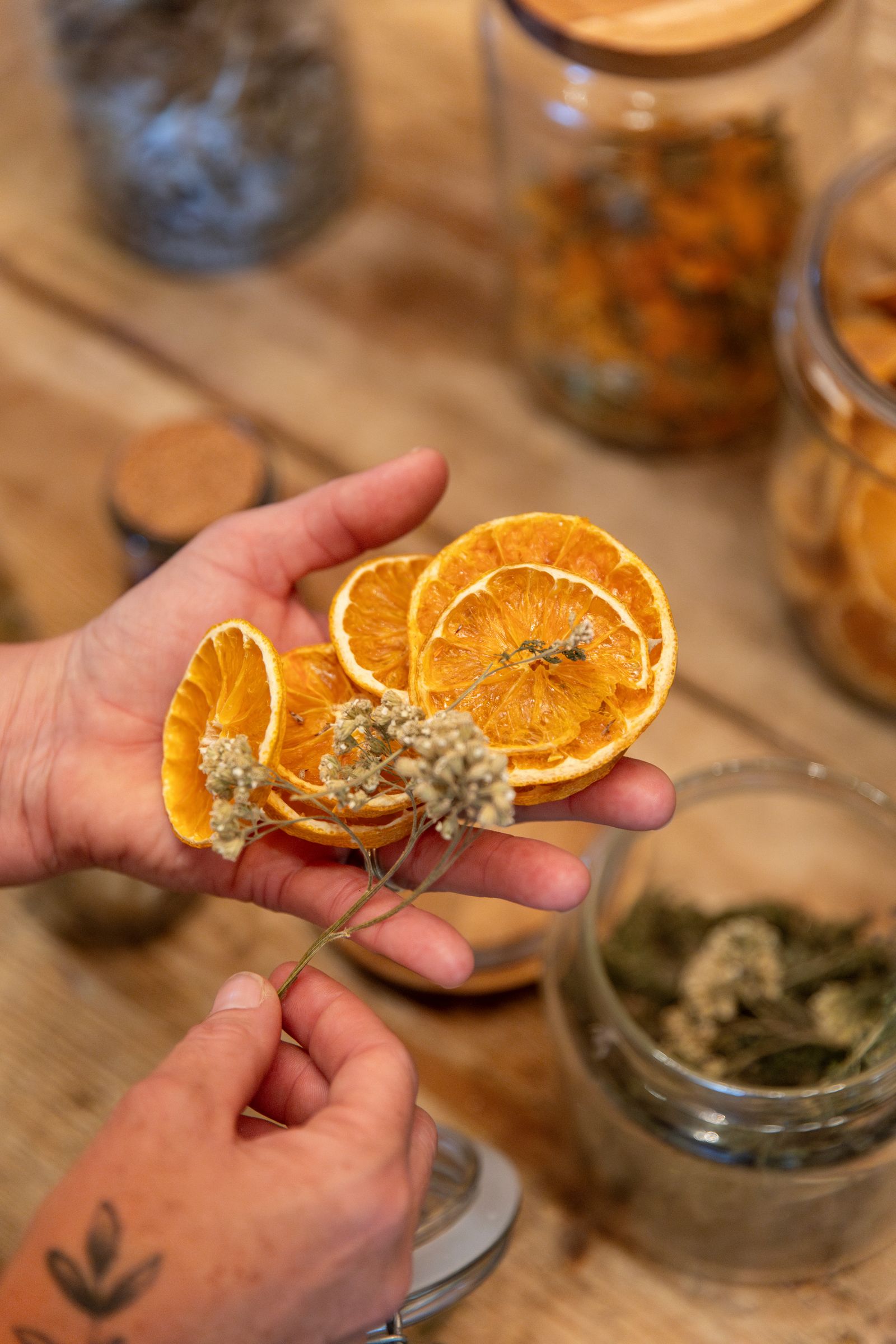 Image may contain Food Food Presentation Citrus Fruit Fruit Plant Produce Cup Baby Person Jar and Orange