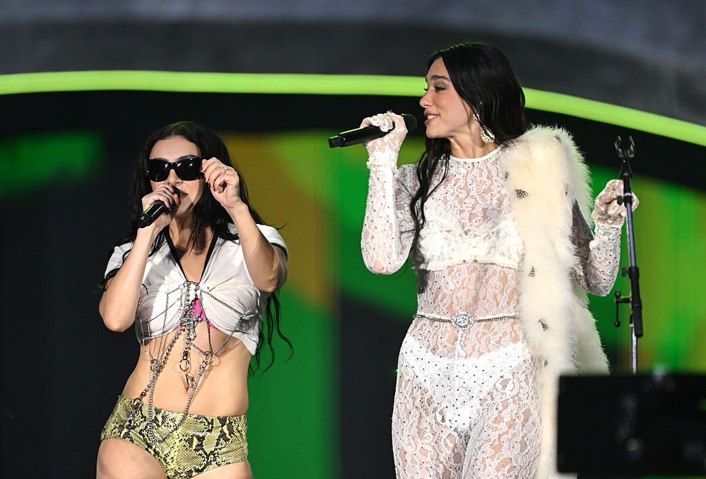 Image may contain Dua Lipa Charli XCX Adult Person Leisure Activities Music Musical Instrument and Musician