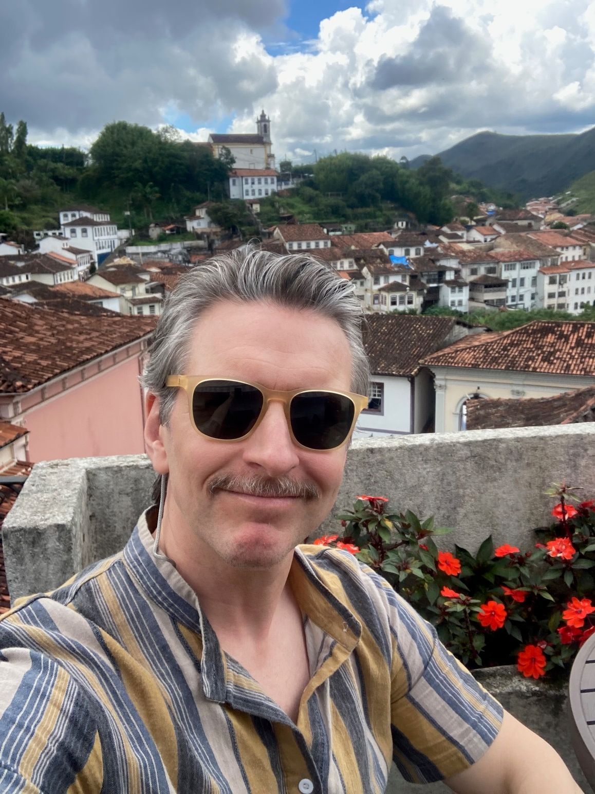 Image may contain Accessories Sunglasses Face Head Person Photography Portrait Plant Potted Plant and Glasses