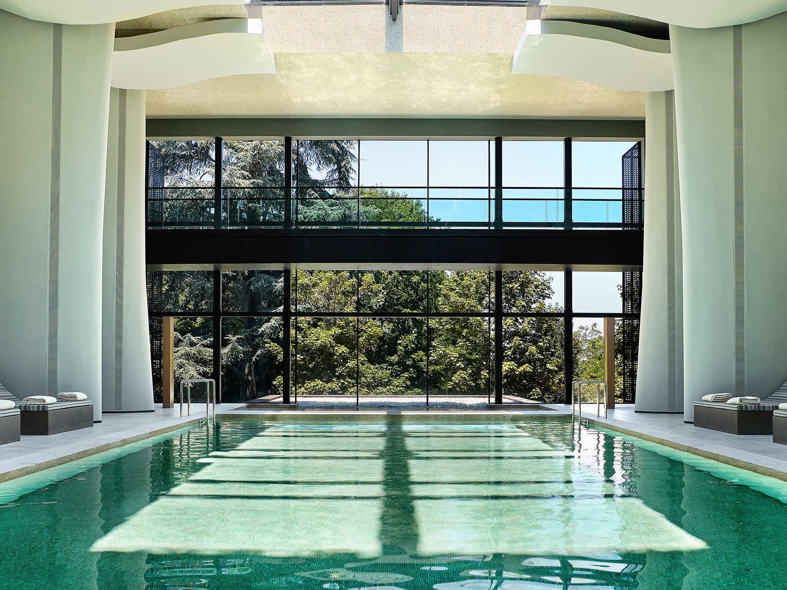 Image may contain Pool Water Building Floor Flooring Swimming Pool Banister Handrail and Indoors