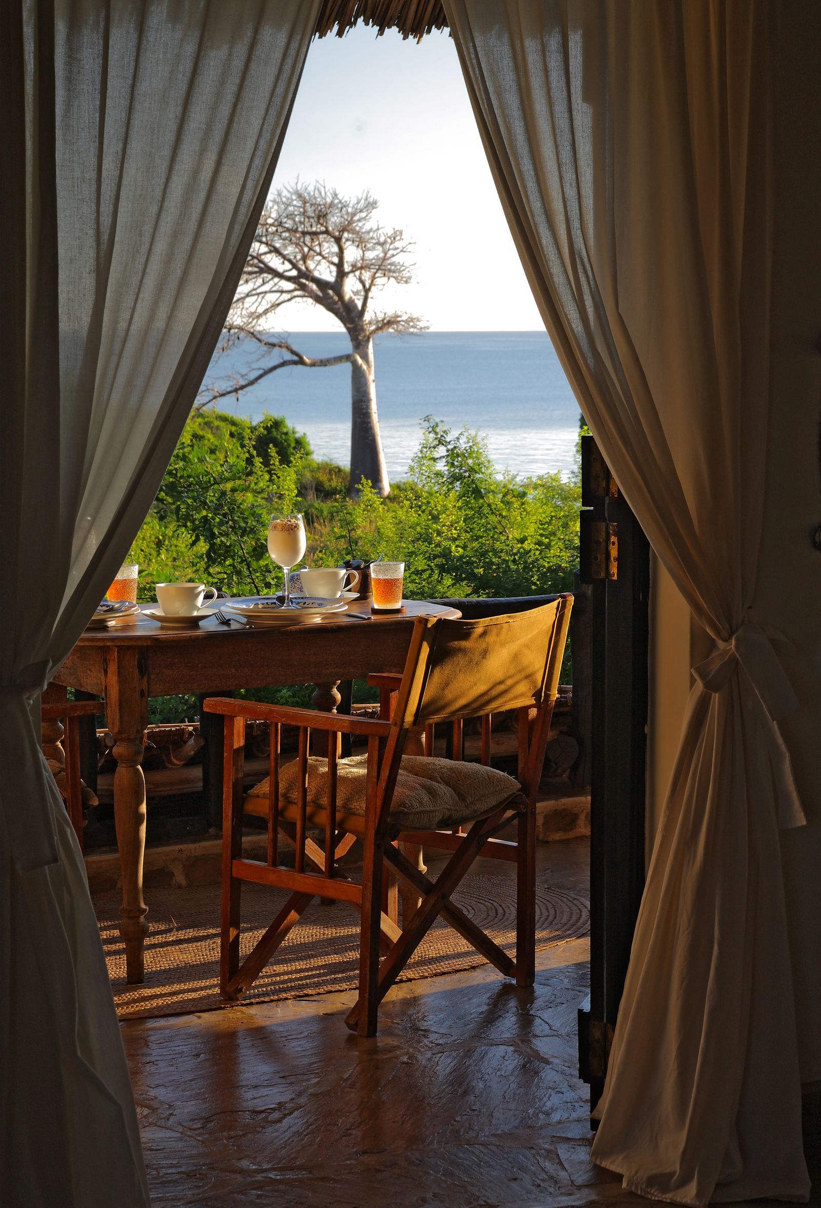 Image may contain Dining Table Furniture Table Architecture Building Dining Room Indoors Room Nature and Outdoors