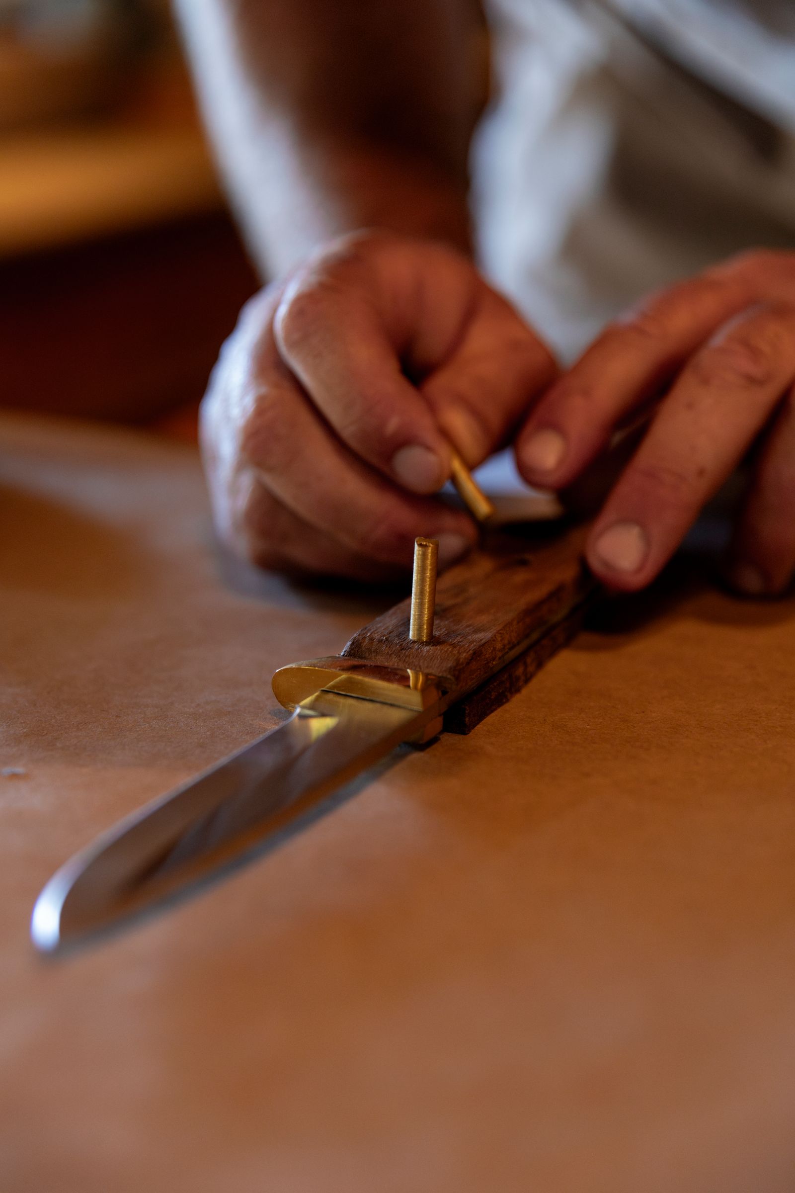 Image may contain Blade Knife Weapon Baby and Person