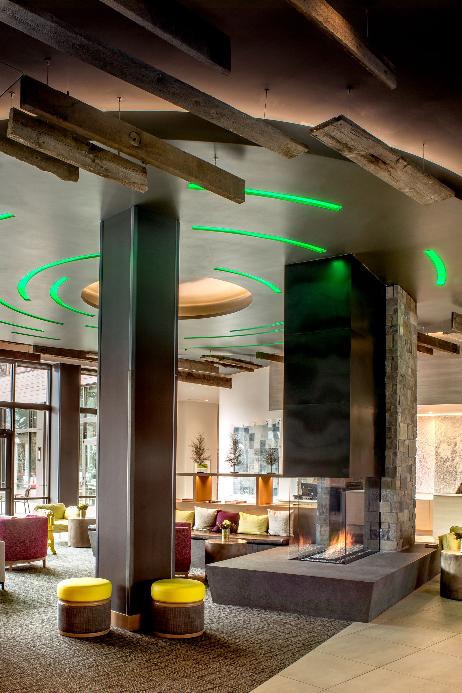 lobby of hotel. fireplace. couches. seating area