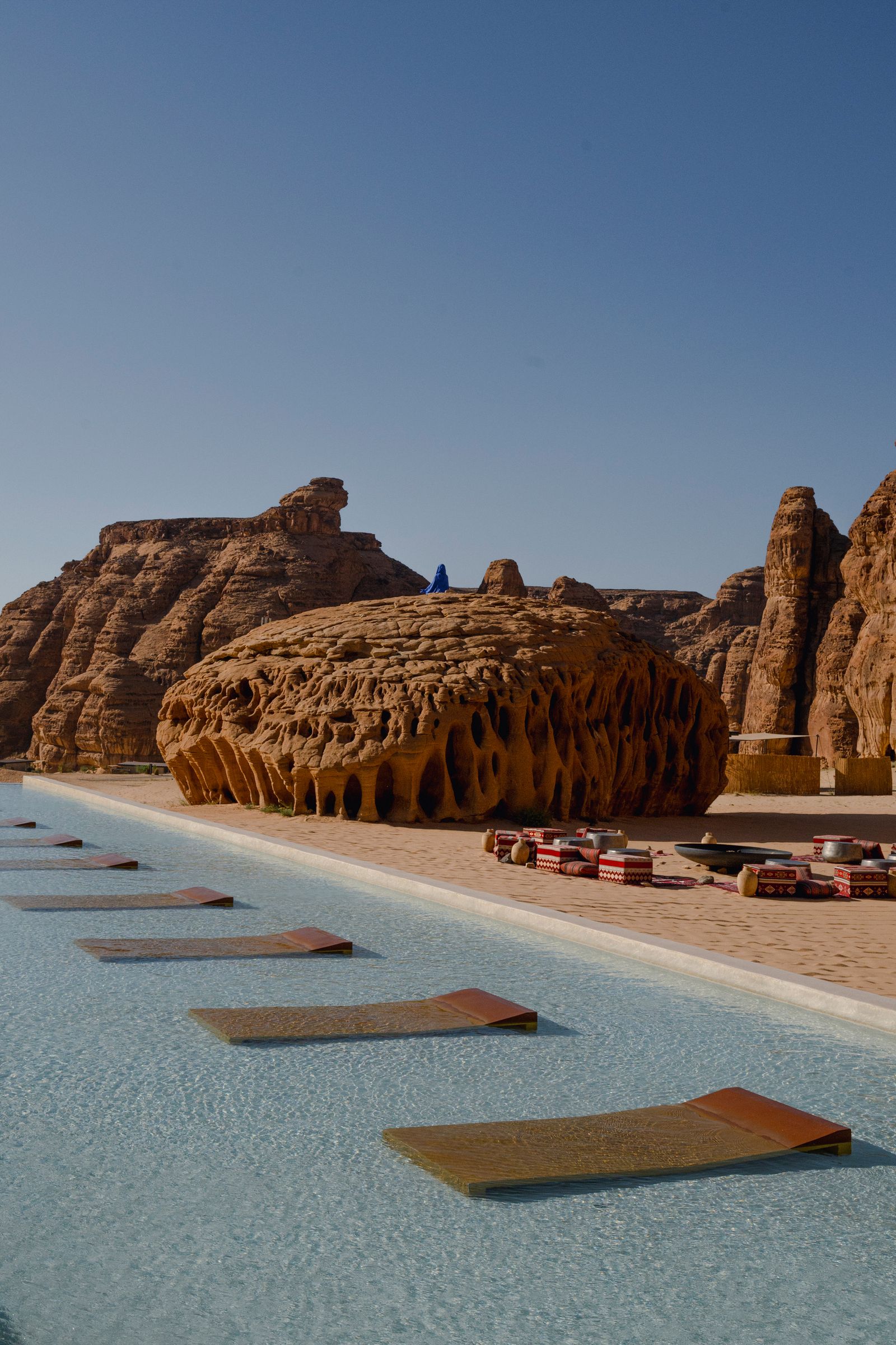 Image may contain Outdoors Beach Coast Nature Sea Shoreline Water Pool Swimming Pool and Rock