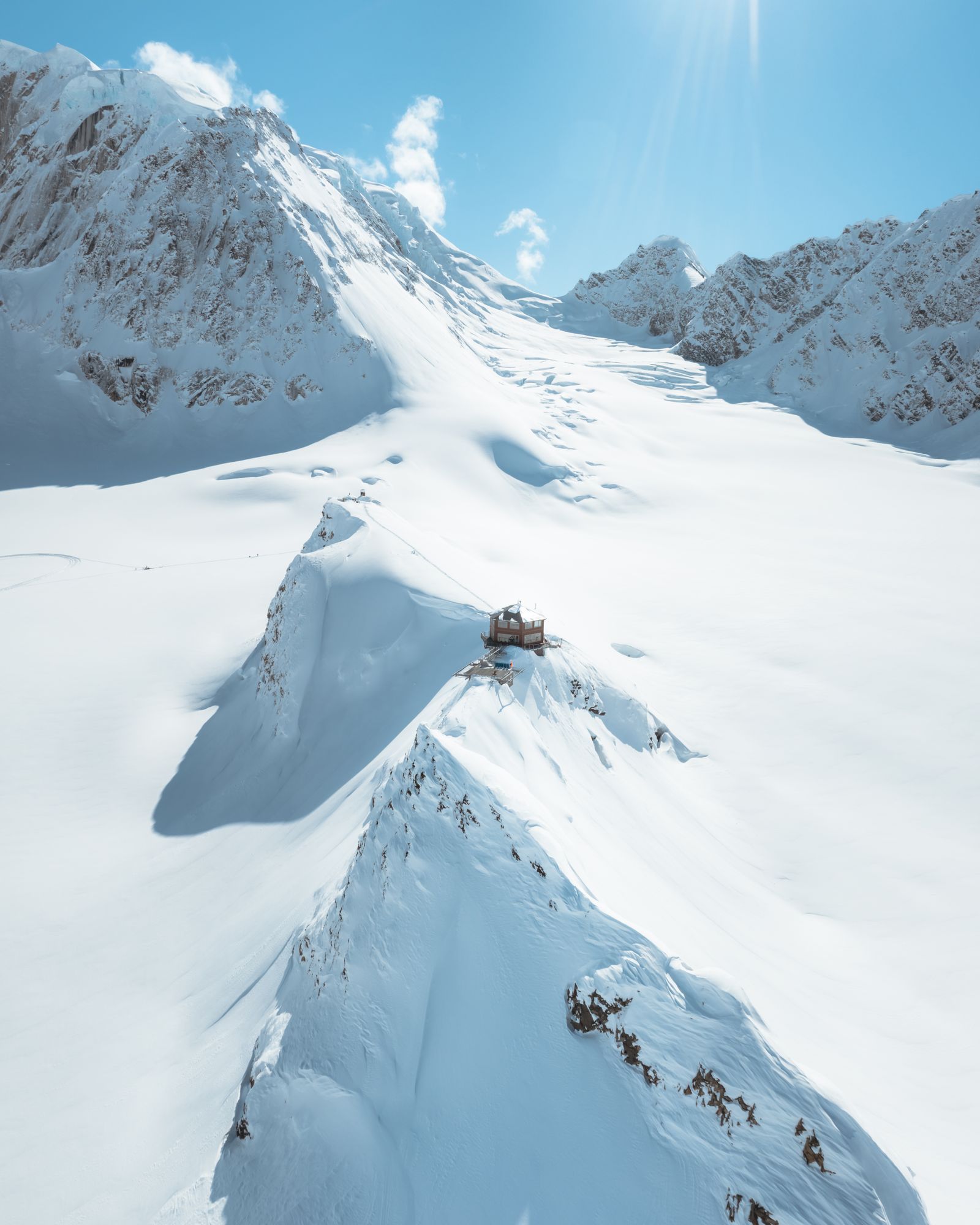 Image may contain Nature Outdoors Mountain Mountain Range Peak and Snow