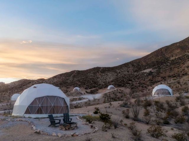 Image may contain: Chair, Furniture, Camping, Outdoors, Tent, Architecture, Building, and Shelter