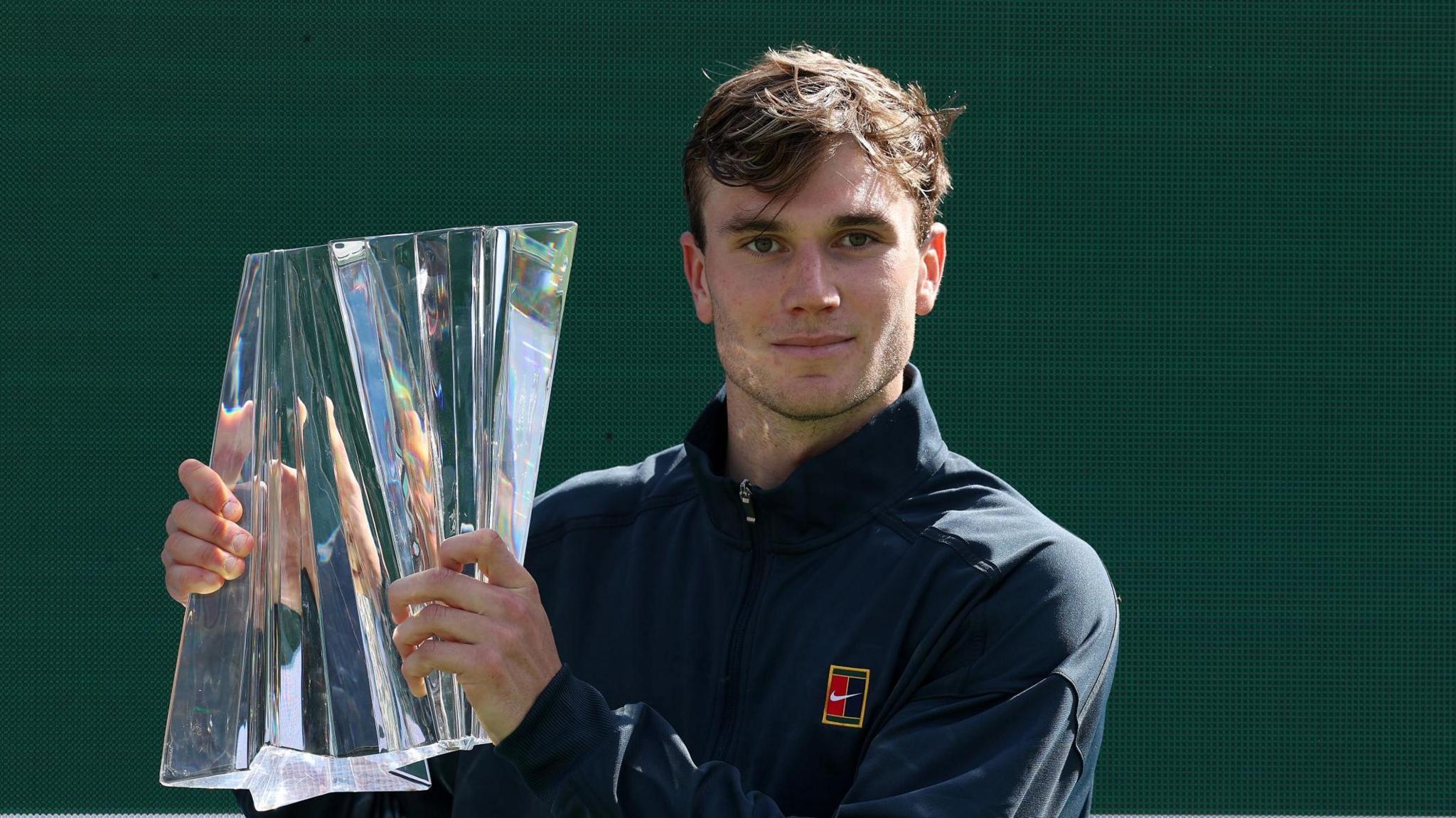 Jack Draper lifts the Indian Wells trophy