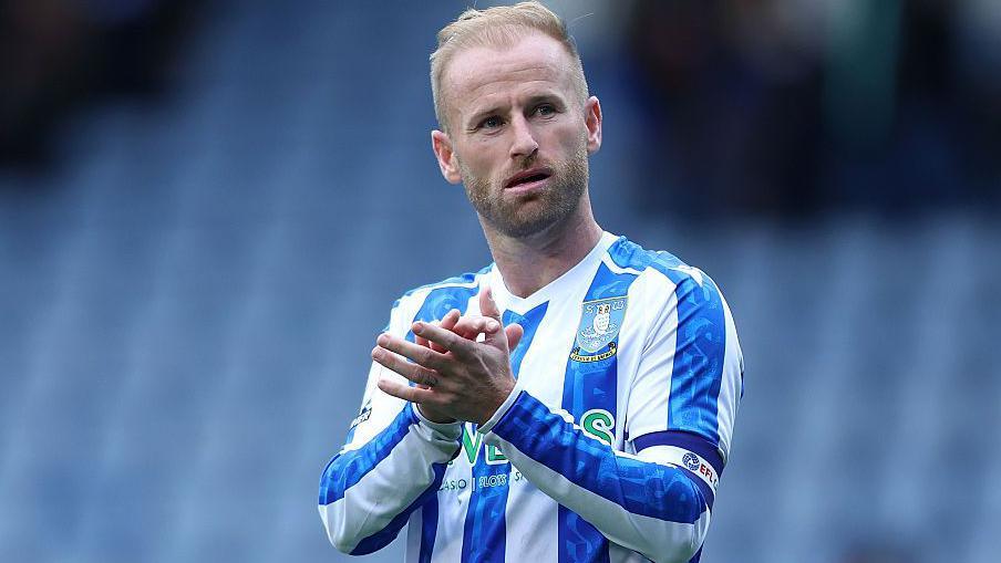 Barry Bannan of Sheffield Wednesday claps the fans