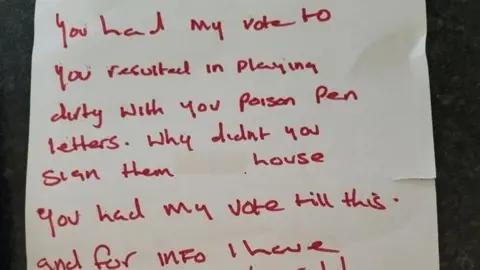 A letter received by ex-Labour member Kevin Robinson-Hale. It says "You had my vote [until] you resulted in playing dirty with your poison pen letters. Why didn't you sign them you [expletive deleted]. You had my vote till this." And then the words run out beyond the crop.