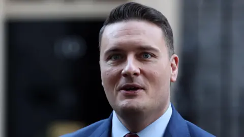 ‘Double whammy’ of flu and strikes a risk to patients, Streeting says