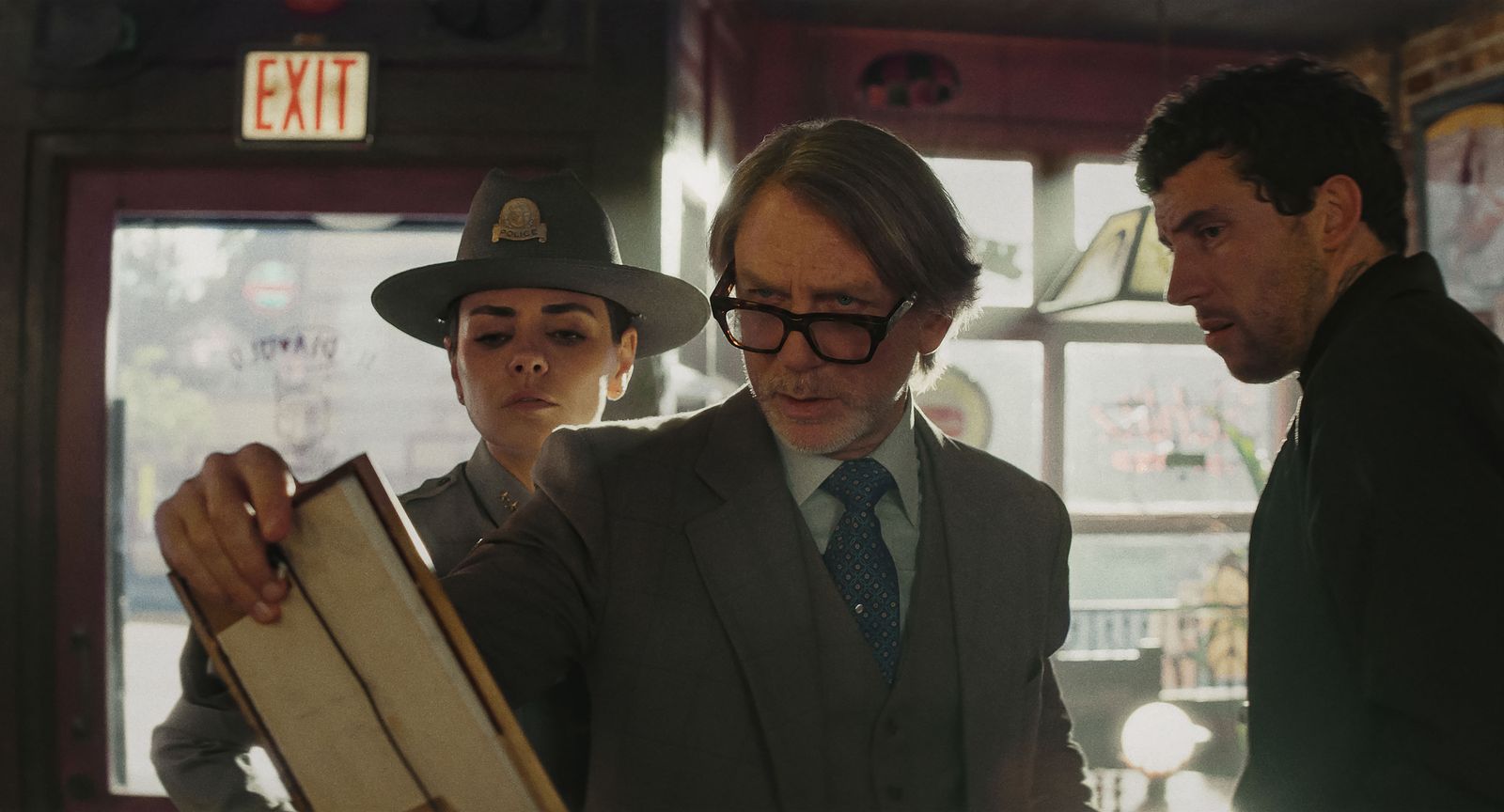 Image may contain Daniel Craig Mila Kunis Face Head Person Photography Portrait Clothing Formal Wear Suit and Coat