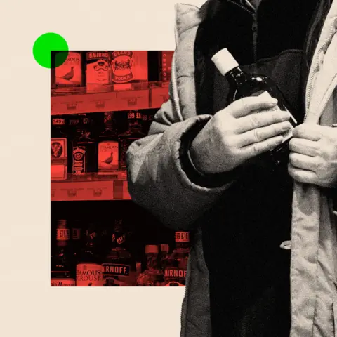BBC A treated image of someone putting a bottle of alcohol into their coat