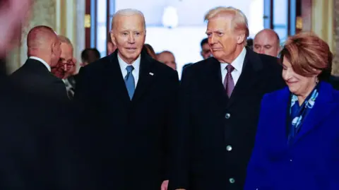 Getty Images Joe Biden with Donald Trump
