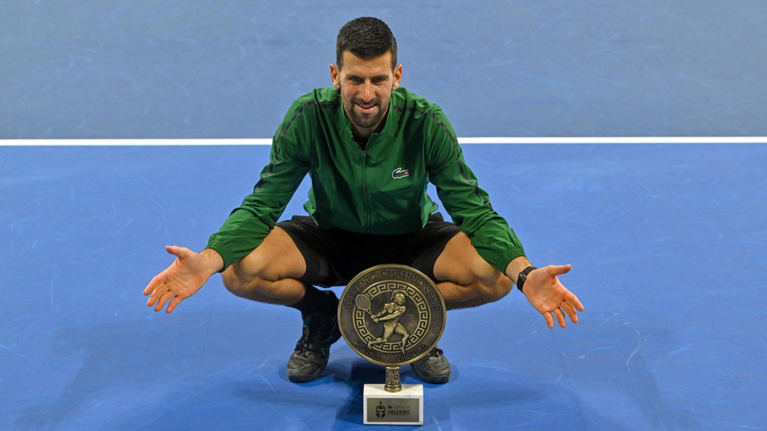 Novak Djokovic celebrates winning the 2025 Hellenic Championships in Athens