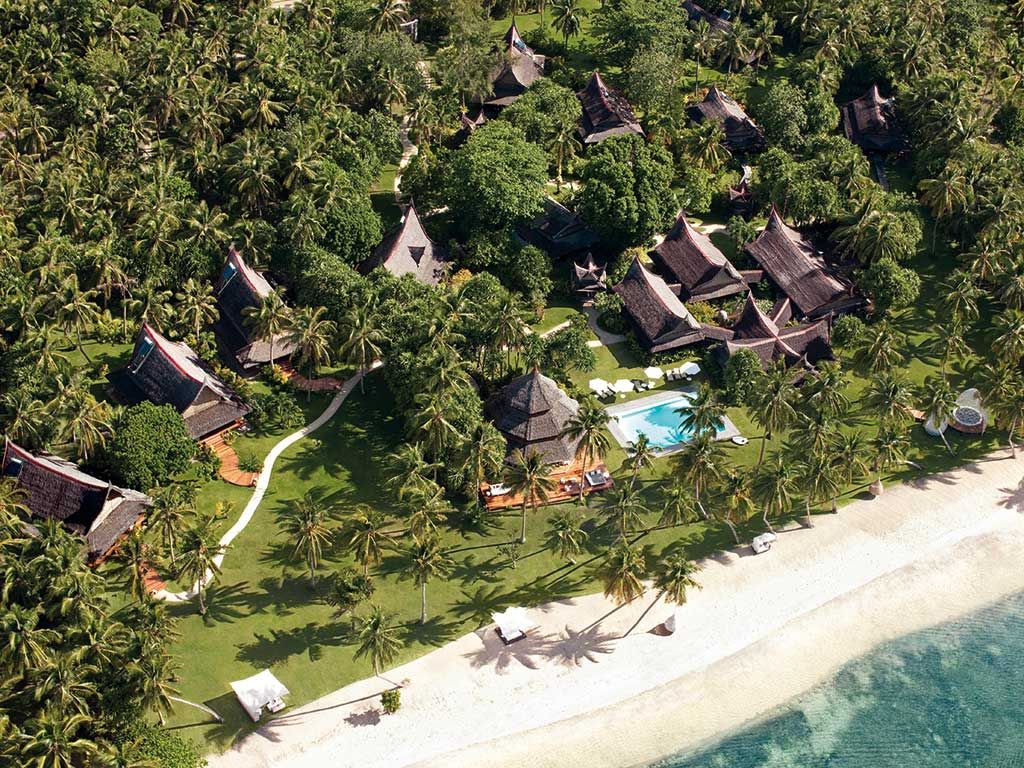 Image may contain Outdoors Nature Land Landscape Scenery Ocean Water Sea Shoreline Coast Building and Hotel