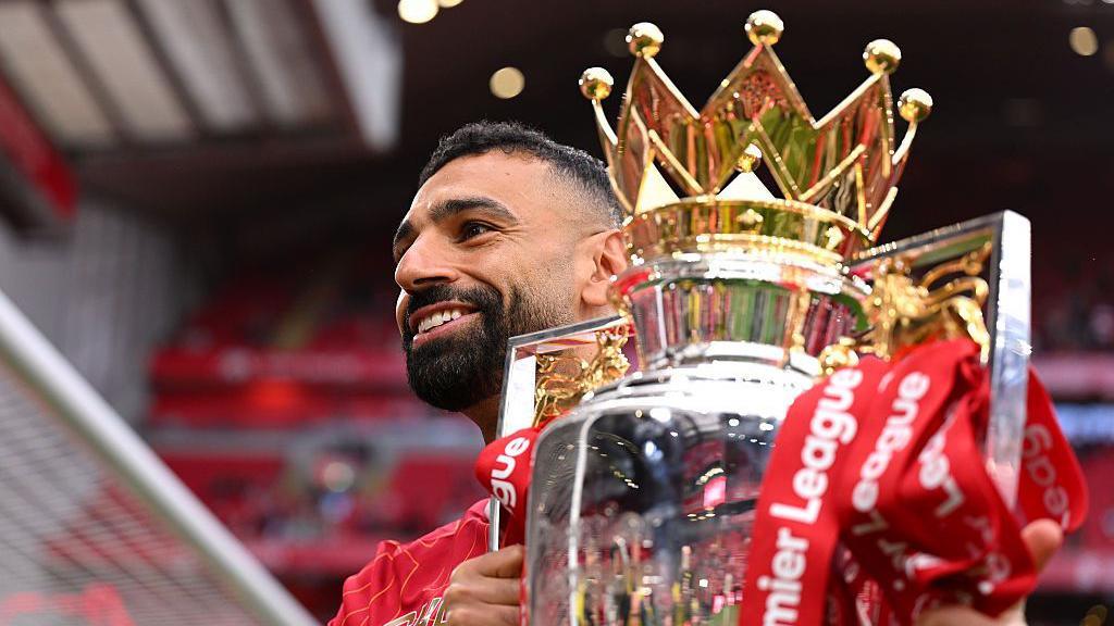 Mohamed Salah with the Premier League trophy
