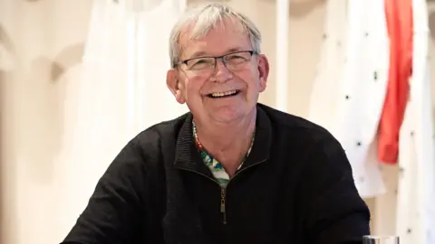 Photographer Martin Parr, whose colourful images captured British life, dies aged 73