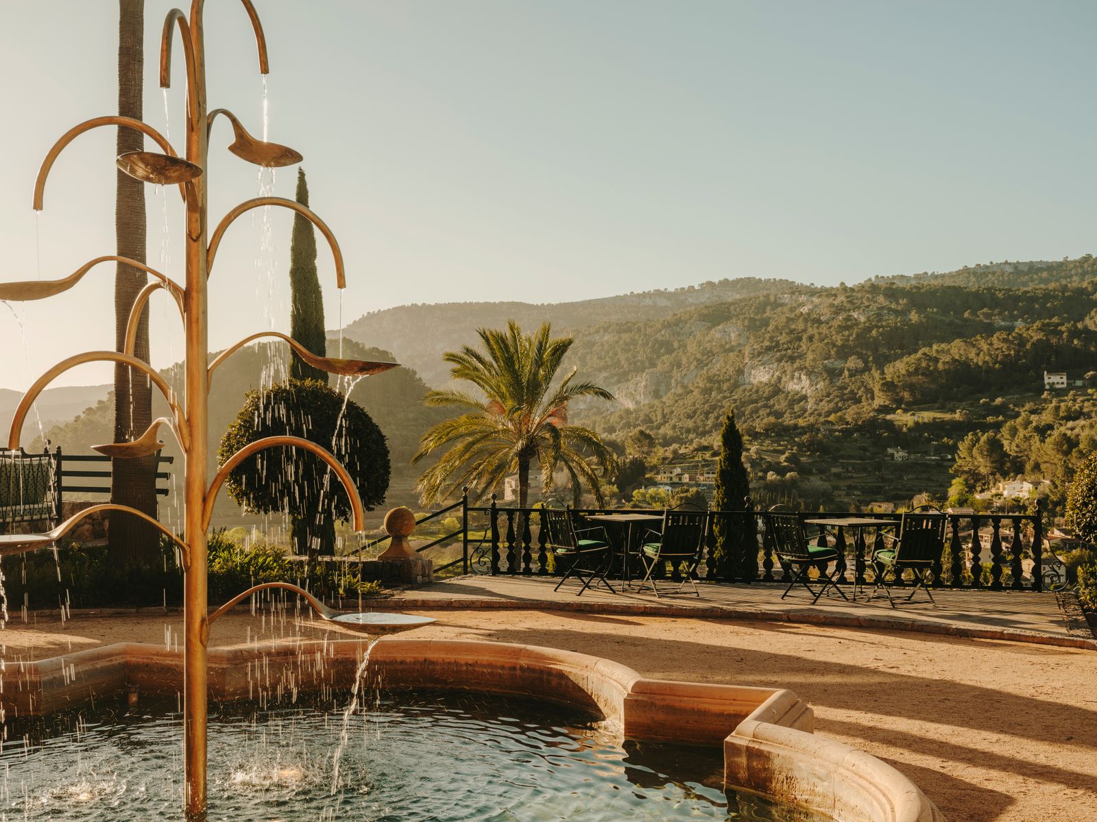 Image may contain Architecture Building Hotel Resort Chair Furniture Pool Water Swimming Pool Indoors and Fountain